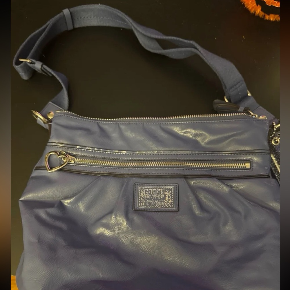 NWOT Coach Lavender/Blue Perfect Condition Purse.  Small but LOTS of Pockets